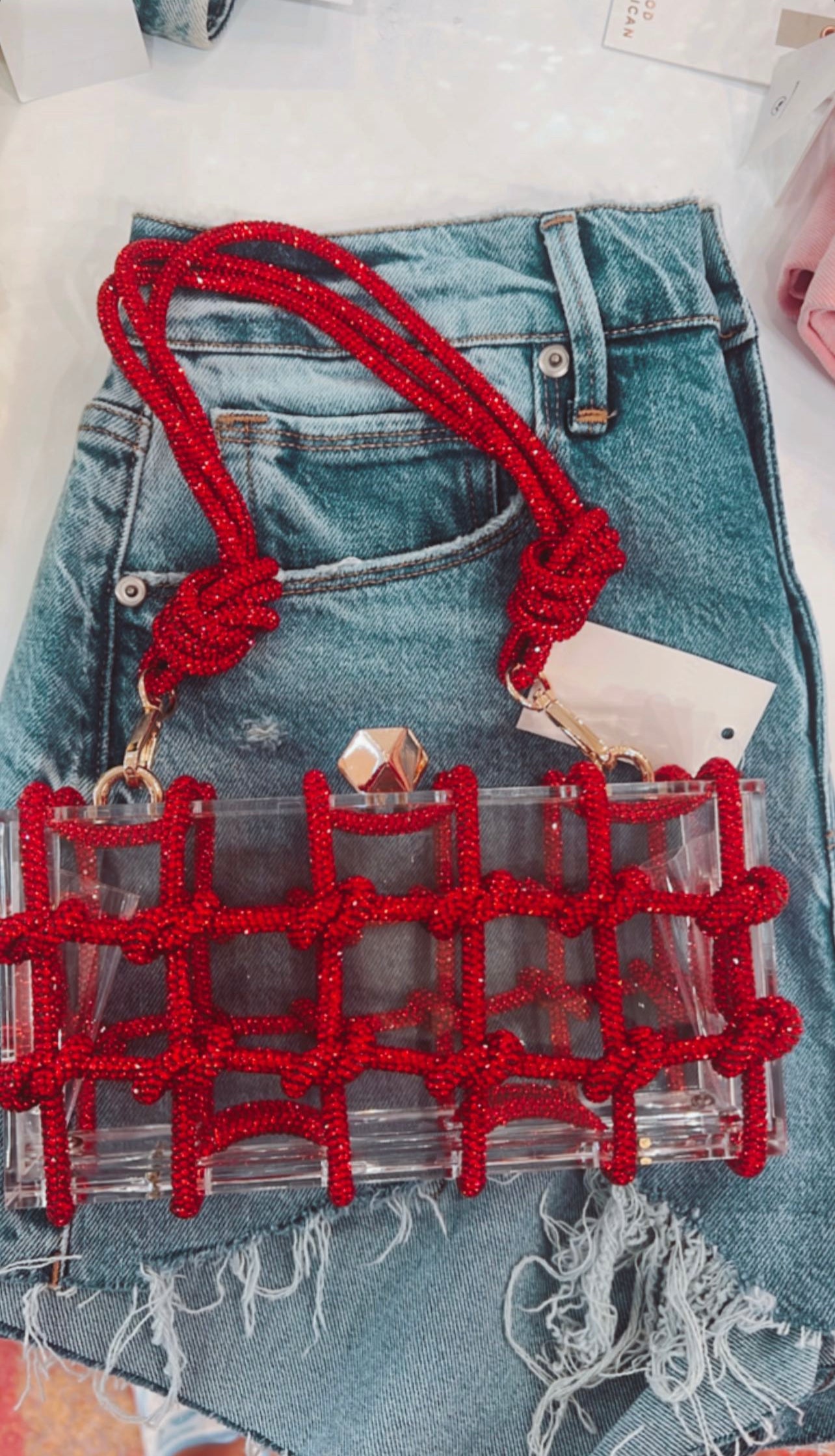 CLEAR RED EMBELLISHED CLUTCH