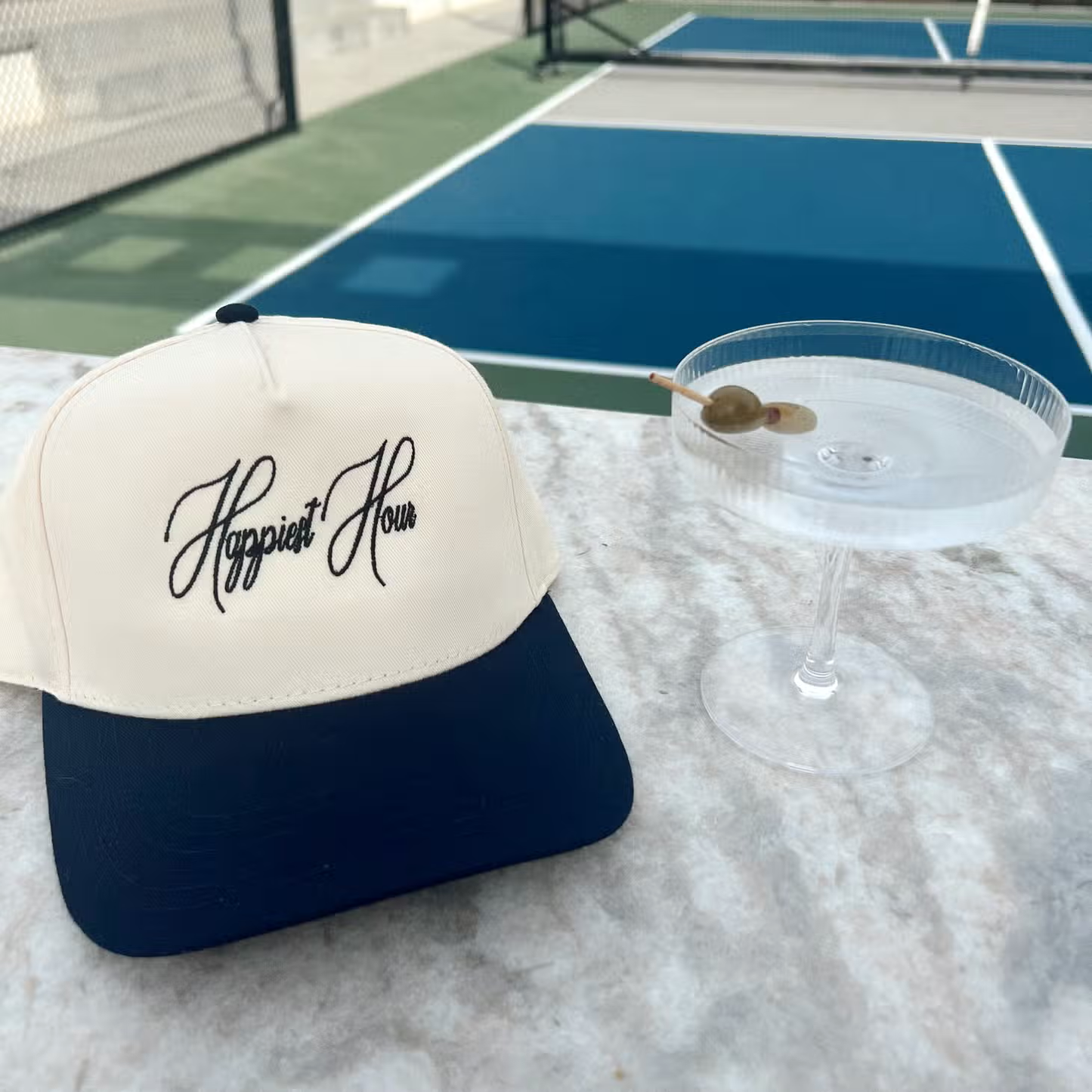 Happiest Hour-Embroidered Trucker- Nvy/Natrl Hat Blk Thread