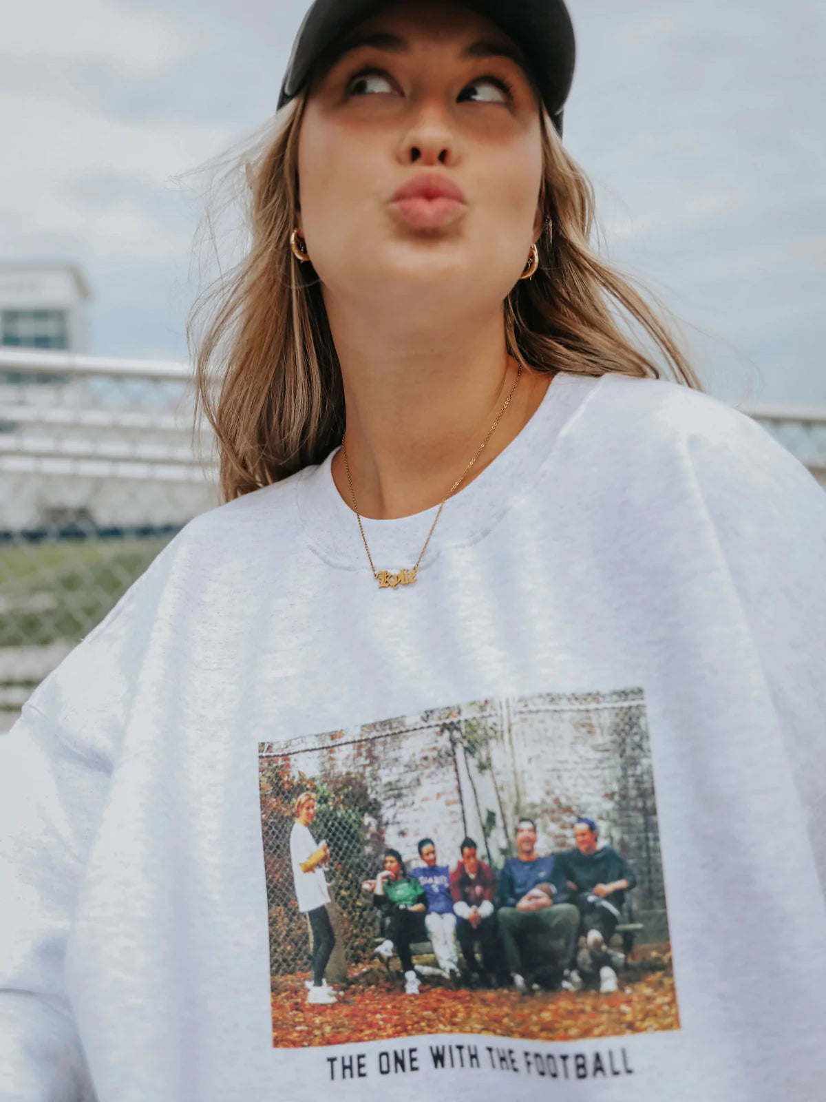 THE ONE WITH THE FOOTBALL SWEATSHIRT