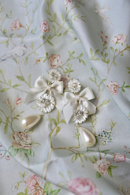 Nicola Bathie Embellished Mother of Pearl + Ivory Bow